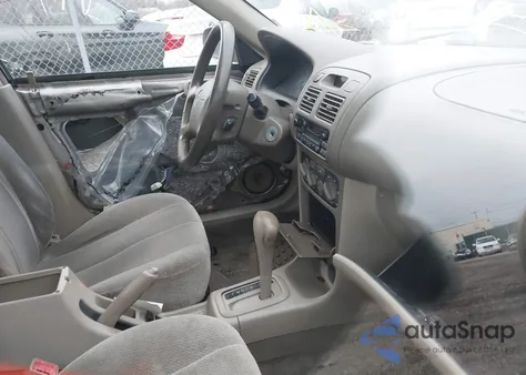 2002 Toyota Corolla Le из США, поврежденный, VIN 2T1BR12E22C575903